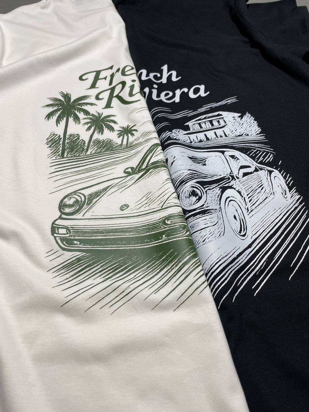 zwart en wit losse fit t-shirt collectie met een French Riviera geïnspireerd ontwerp. met een Porsche afgebeeld. klassieke motorsport, autosport en auto's. automotive. verkrijgbaar in small, medium en large. premium kwaliteit.