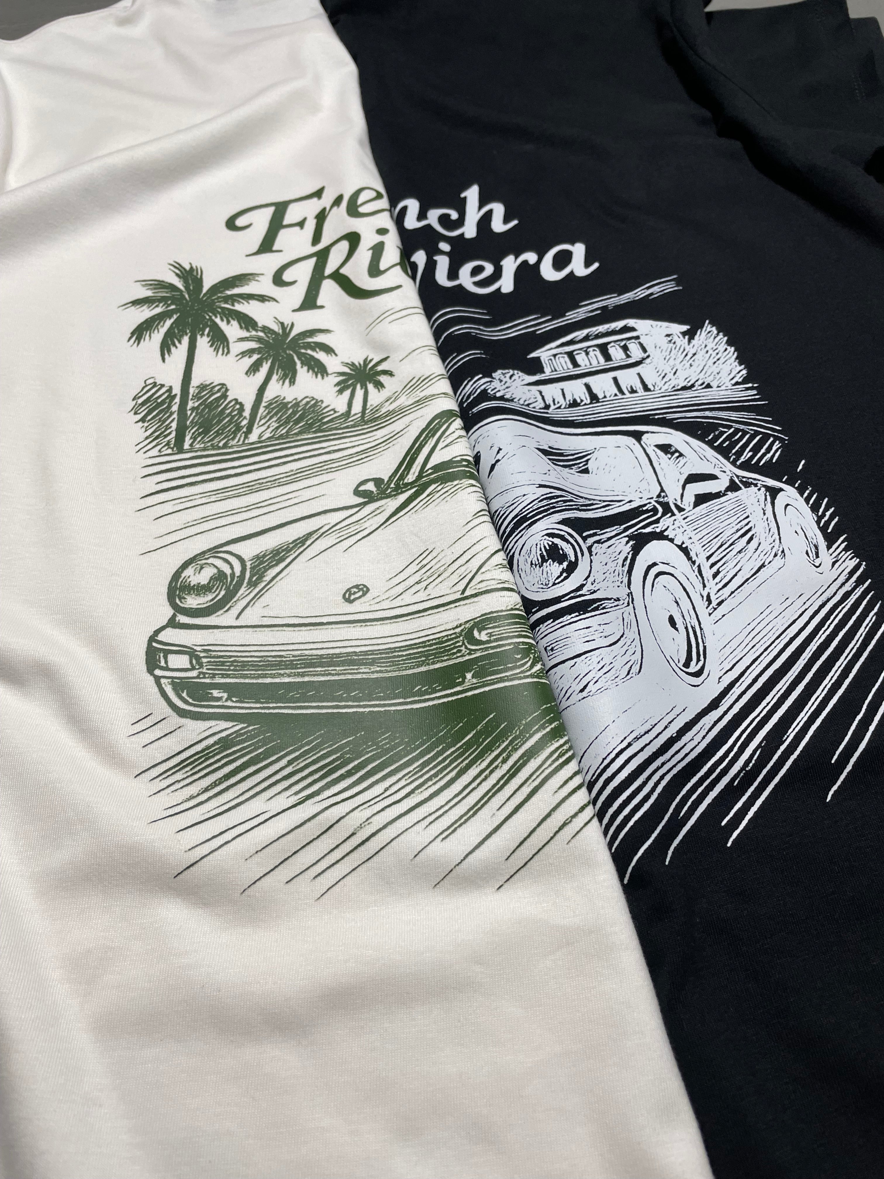 zwart en wit losse fit t-shirt collectie met een French Riviera geïnspireerd ontwerp. met een Porsche afgebeeld. klassieke motorsport, autosport en auto's. automotive. verkrijgbaar in small, medium en large. premium kwaliteit.