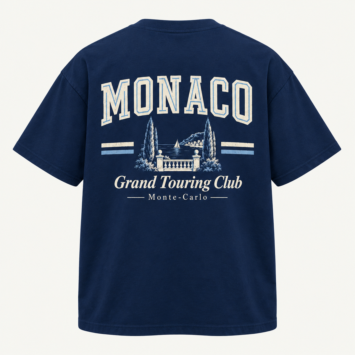 een blauw t-shirt met een vintage/varsity Monaco Turing club ontwerp op de rug. 